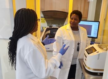 Photo of Dr. Frances Williams and April Falconer working in the lab at Tennessee State University. 